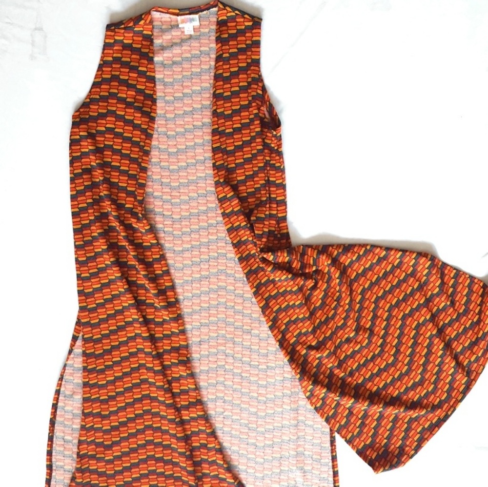 Beautiful colors in this Small Lularoe Joy vest.